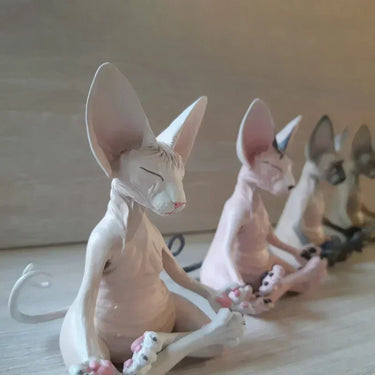 KittyNook Cat Co.'s Peaceful Meditating Cat Sanctuary Statues sit cross-legged, eyes closed, paws together in calm unity.